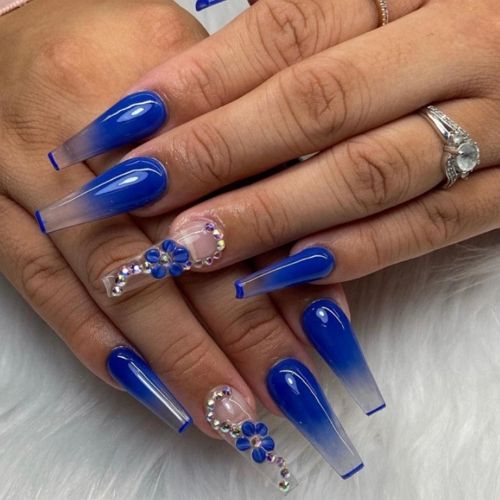 royal blue acrylic coffin nails with transparent ombre tips and diamonds