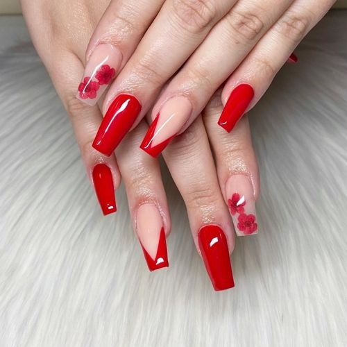 red coffin nails with french tips, flowers and glossy finish