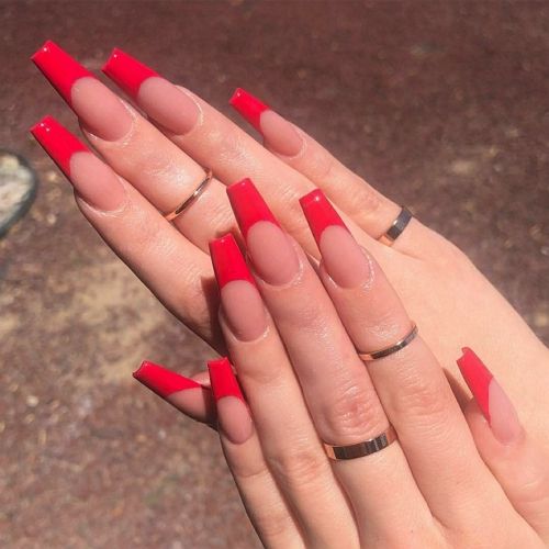 long coffin nails with red french tips and glossy finish