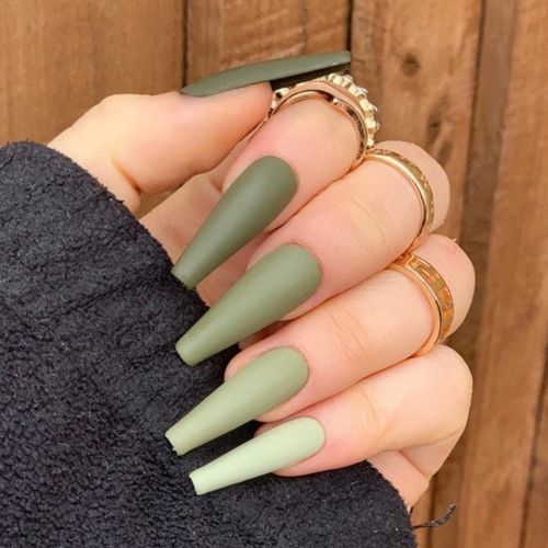 long coffin nails in sage green color and ombre design