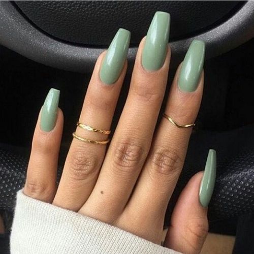 sage green coffin nails with slightly rounded edges and glossy finish