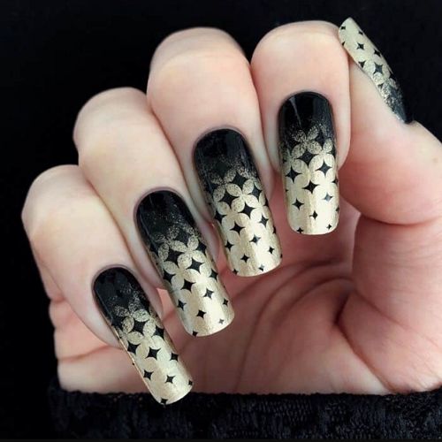 black and gold ombre nails with stars