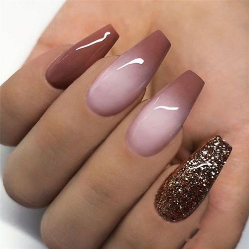 brown ombre nails with glitter elements and glossy finish