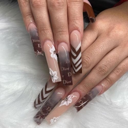long acrylic nails with brown elements and ombre inspired by dior