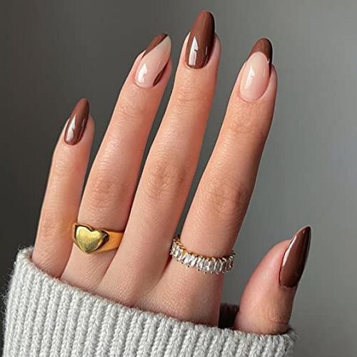 short round acrylic nails with brown accents