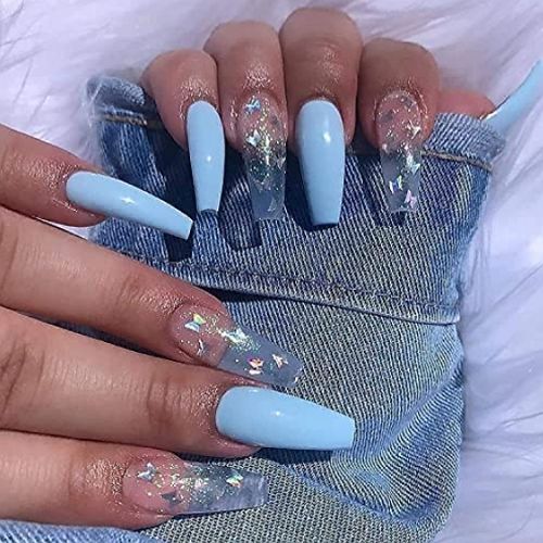 light blue nails with glitter and transparent elements