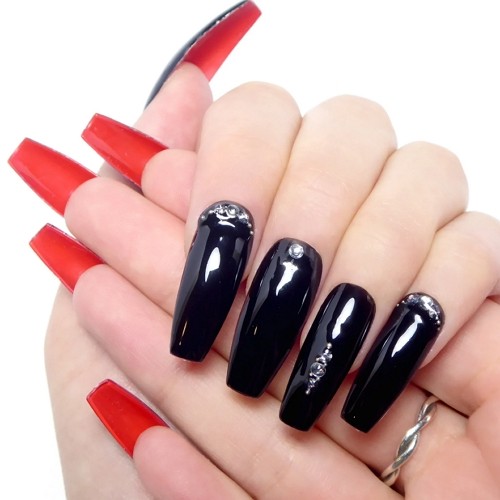 glossy black coffin red bottoms nails with tiny rhinestones