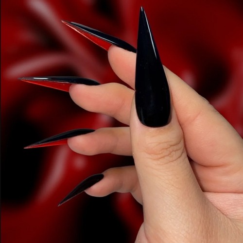long black stiletto red bottom nails
