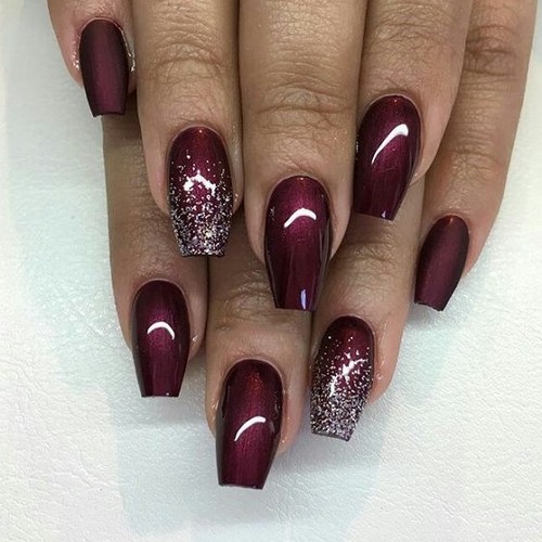 medium-length acrylic coffin burgundy nails with glitter ombre on some nails