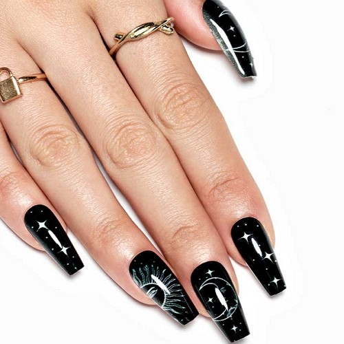 medium length glossy black press-on coffin moon nailswith stars, sun and other design elements