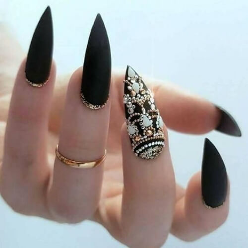 Black and putrple stiletto gothic nails with pearls and swarowski elements